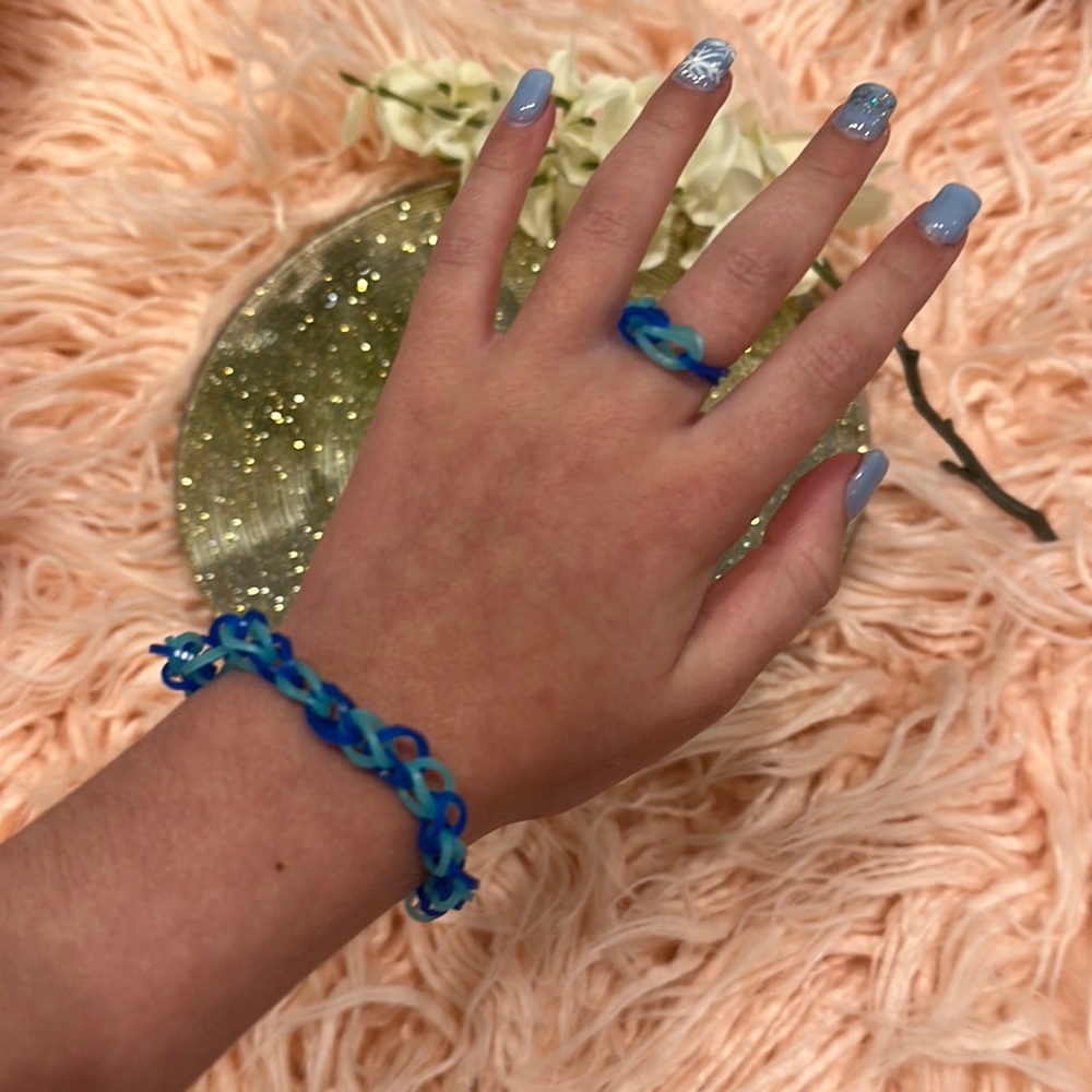 A handmade bracelet with a ring. For all ages and genders.